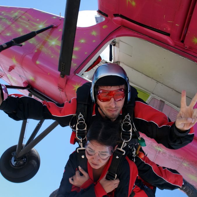 2 people jumping out of plane, How much does skydiving cost