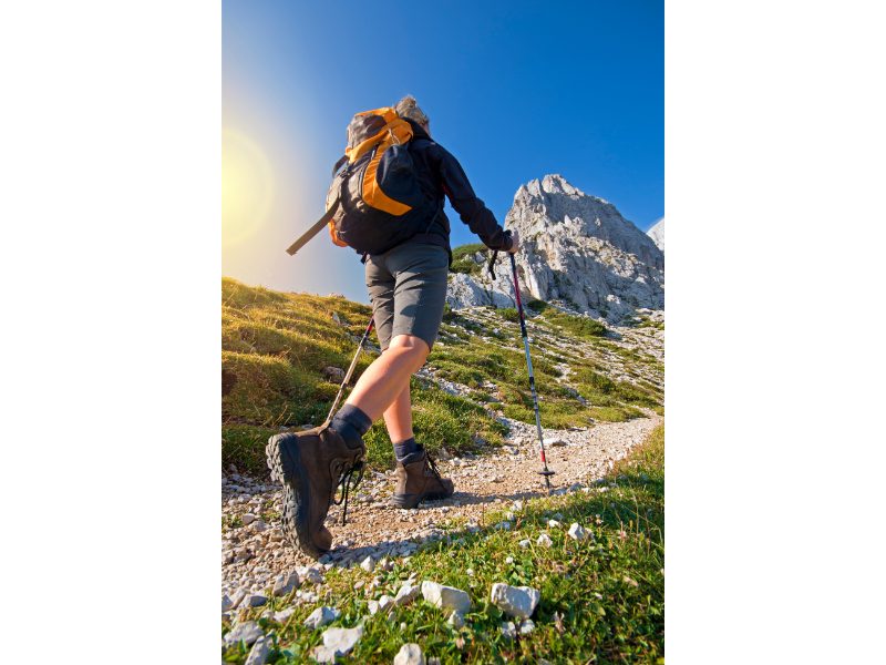 girl walking in the mountains for a hike