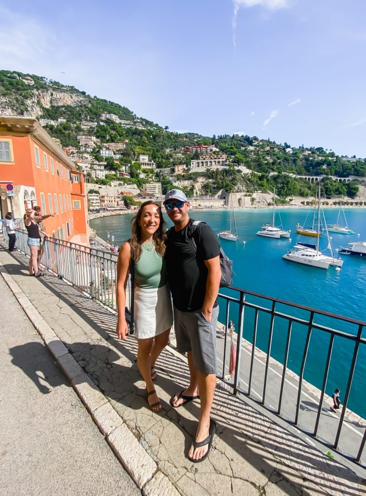shot of two people in front of nice france background