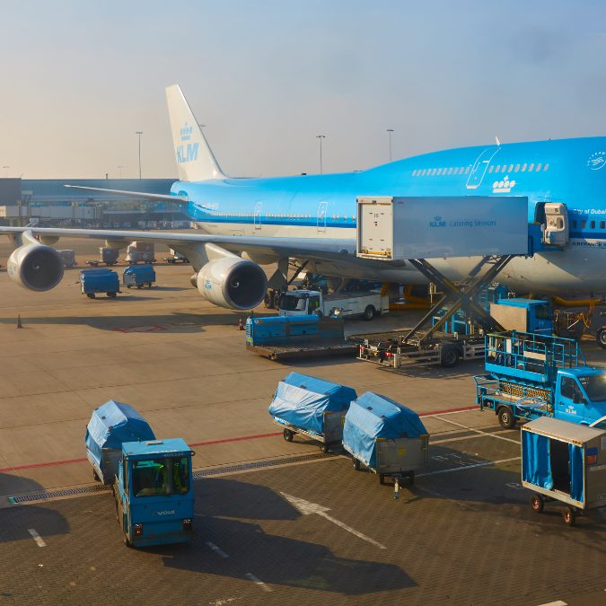 Big blue plane with KLM written on the side at an airport Best International Airlines To Fly To Europe