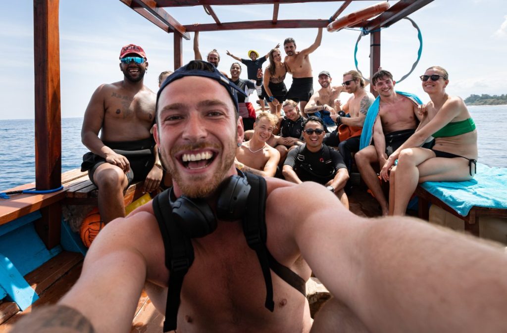 group of scuba divers on a boat after a scuba dive 