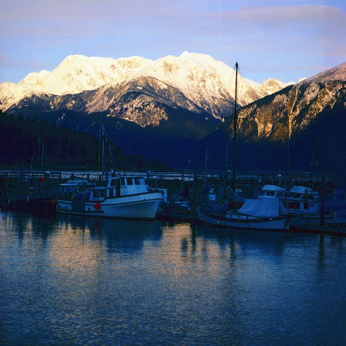 small village in alaska with fishing boats