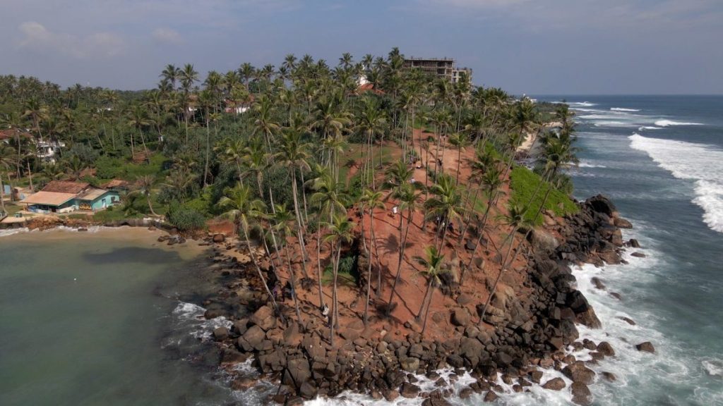 aerial shot of coconut tree hill in mirissa sri lanka
